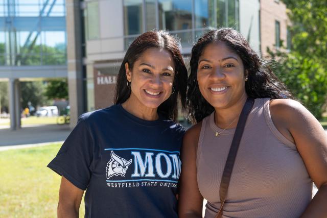 Mother and daughter smiling together on Move-In Day.